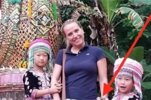 這個女人在泰國旅遊時，跟當地的兒童拍了一張合照，但回家後她發現的驚人的畫面……大喊惡心！