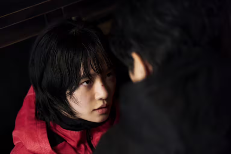 《魷魚遊戲3》飾演三角形士兵的北韓女兵姜霞。(Netflix提供) 《魷魚遊戲3》飾演三角形士兵的北韓女兵姜霞。(Netflix提供)