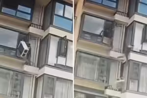 安裝一半室外機滑落　工人遭重拉同時墜落