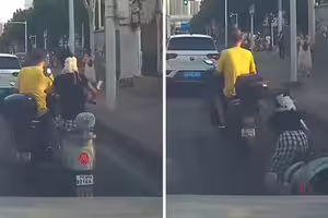 強行超車撞倒女子 竟頭也不回跑了 強行超車撞倒女子 竟頭也不回跑了