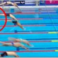 槍響後游泳選手「不肯跳水」卻高舉雙手站在原地，放棄奪金的他竟是為了...讓人忍不住鼻酸！