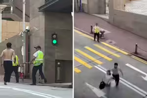 男子大街上揮刀追砍 婦人中刀!保全拚命救人 男子大街上揮刀追砍 婦人中刀!保全拚命救人