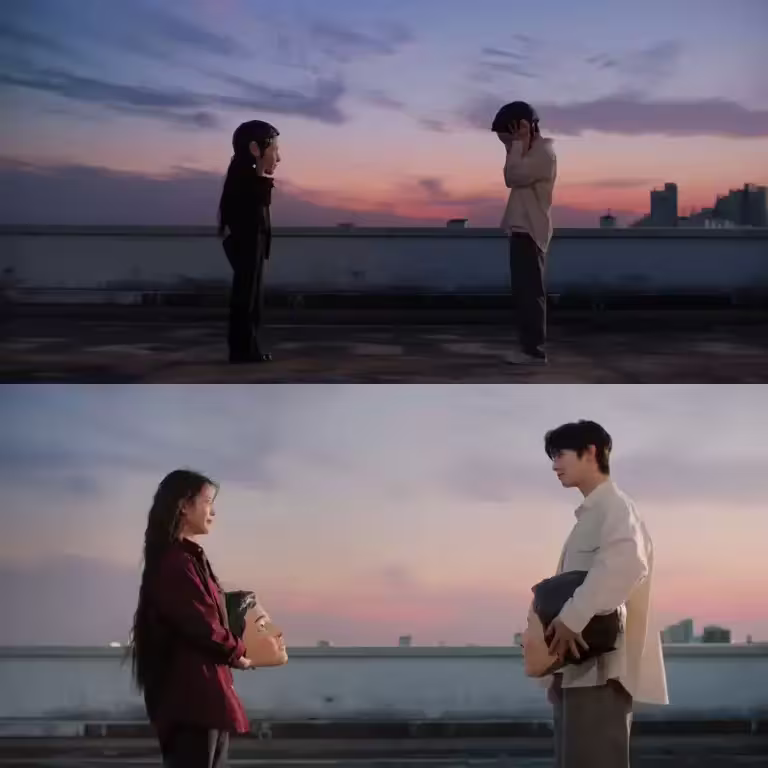 ▲MV中，IU（左）跟車銀優脫下面具、凝視彼此。（圖／이지금 [IU Official] YouTube）