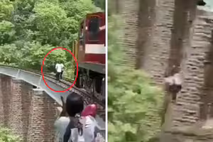 夫妻為拍片闖列車軌道　快被撞上急跳下高架橋