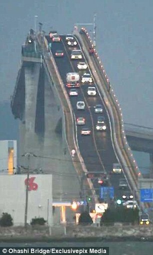 The concrete road bridge, pictured, spans a mile across Lake Nakaumi, linking the cities of Matsue and Sakaiminato