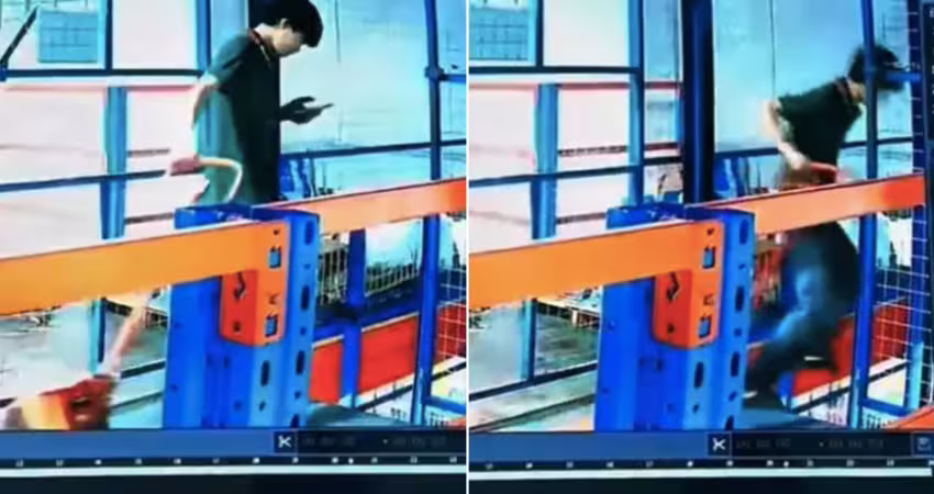 工作時邊滑手機！男子連人帶車墜落電梯井