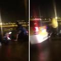 大直橋上機車差點被颱風吹飛，旁邊4台車閃黃燈「一路擋風護送」！網友：「眼淚都快噴出來了！」